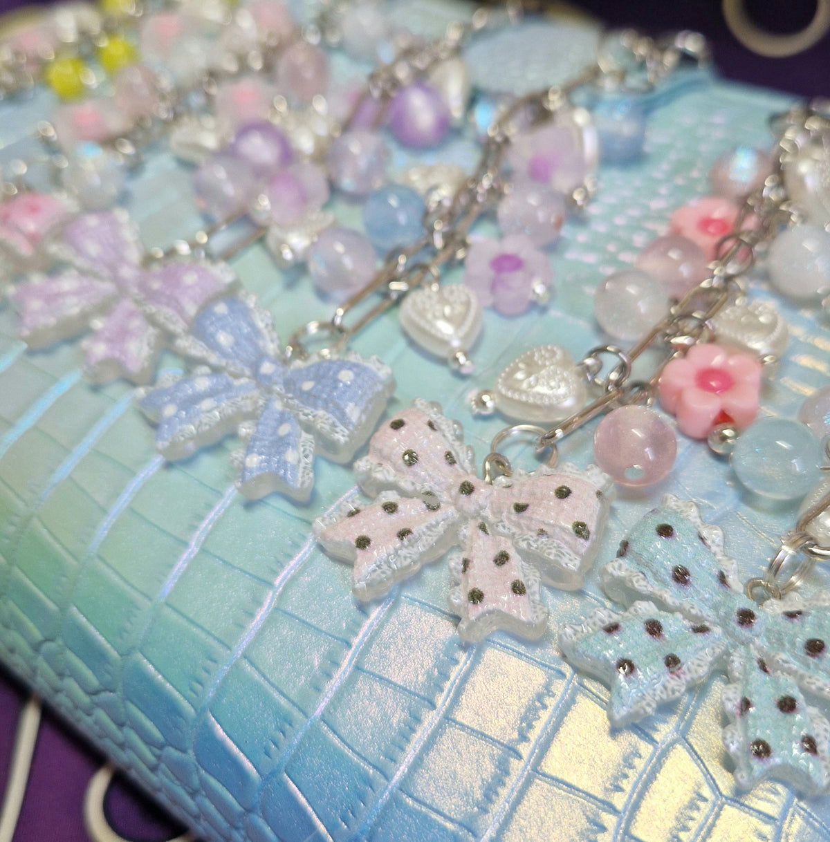 Bow binder charms