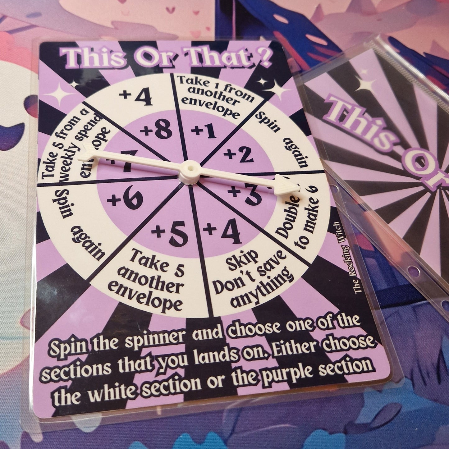 This, That? savings challenge spinner game