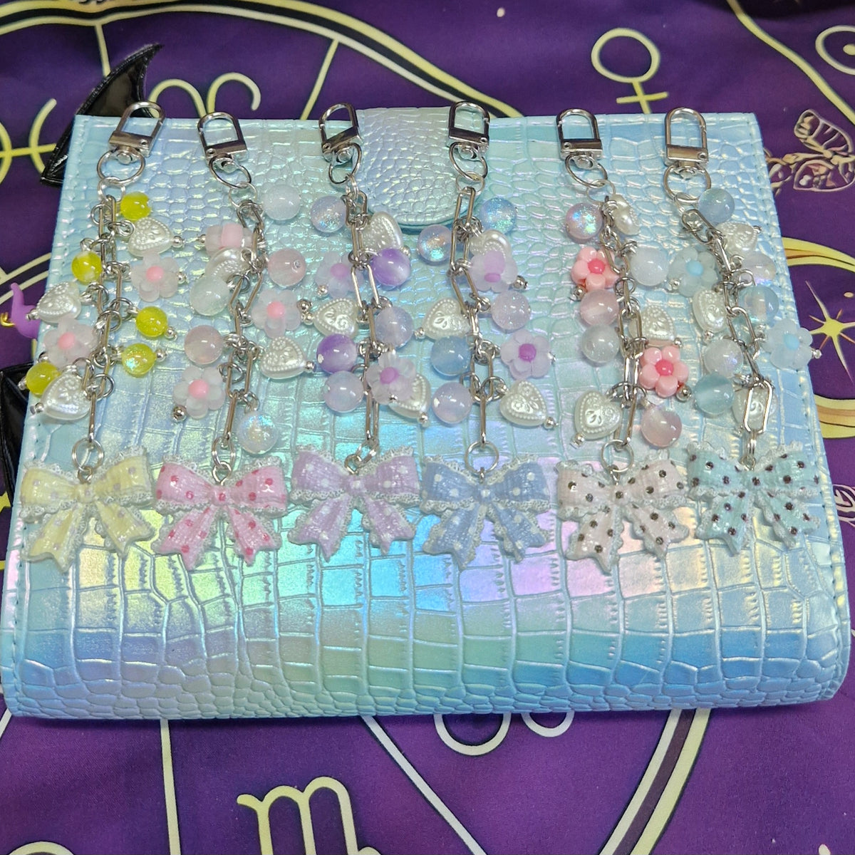 Bow binder charms