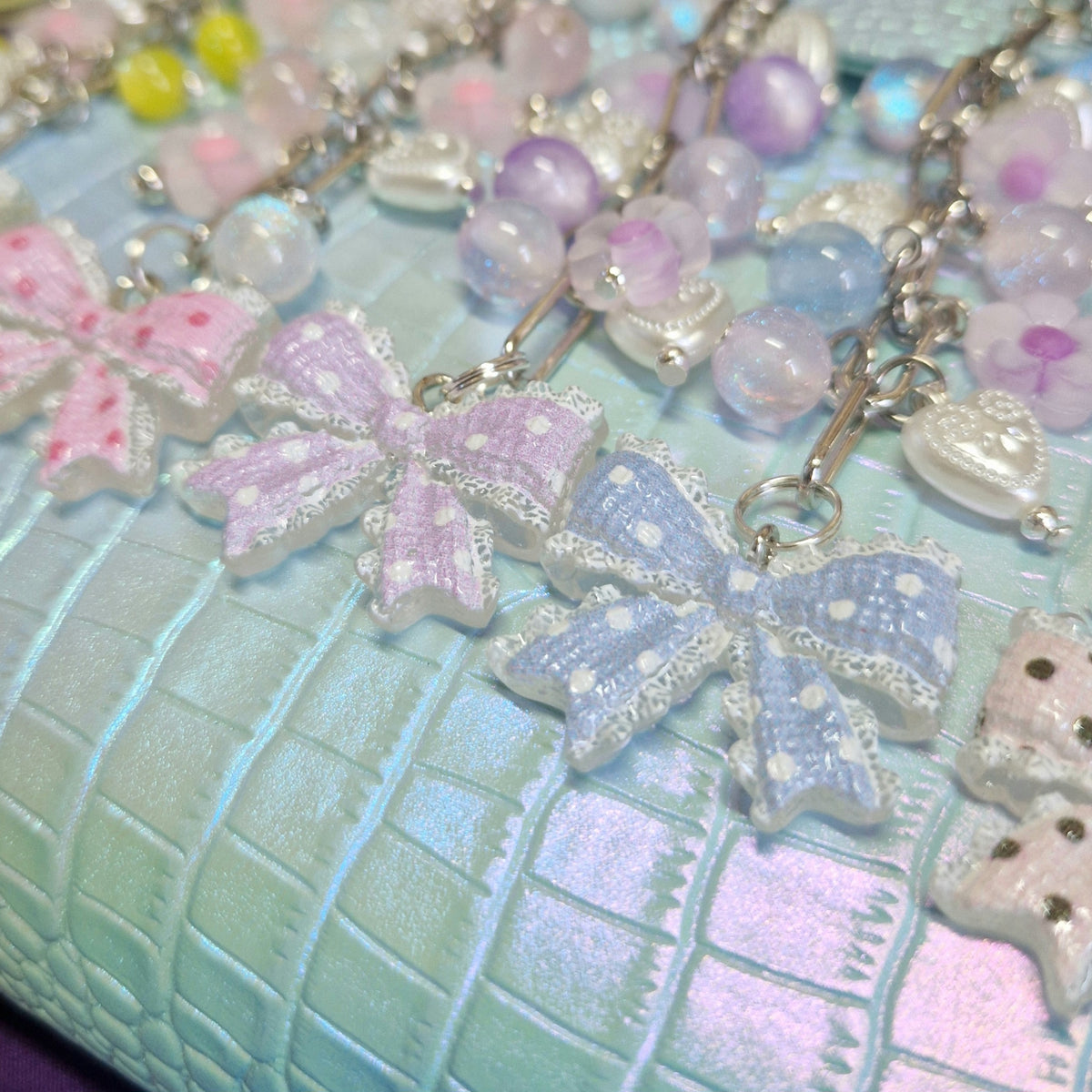 Bow binder charms