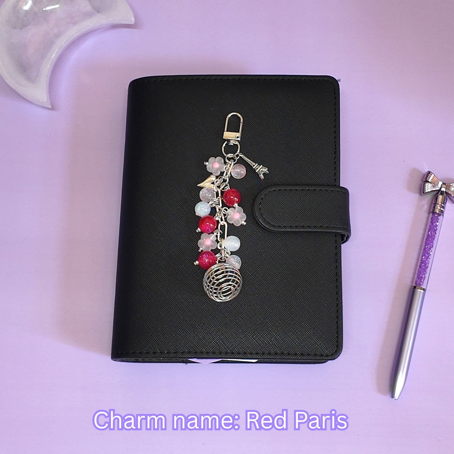 Crystal cage binder charm