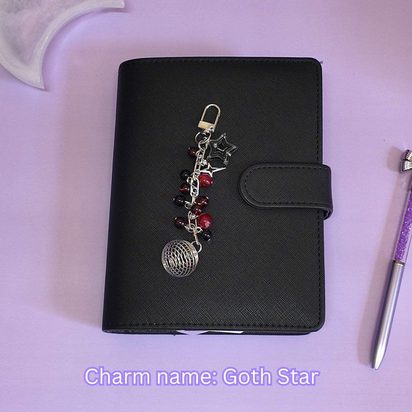 Crystal cage binder charm