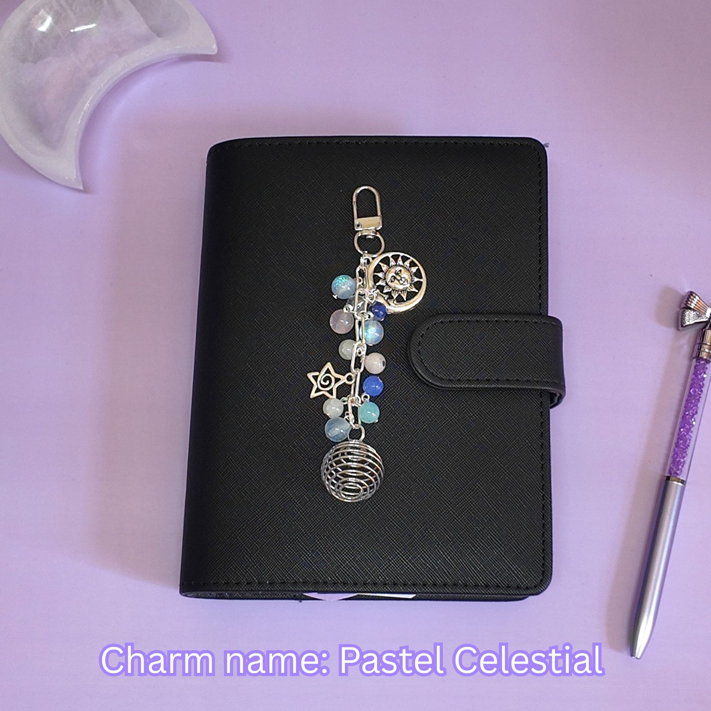 Crystal cage binder charm
